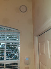 Load image into Gallery viewer, Daisy Ductless Radon Mmitigation Fresh air System fits flush with the drywall surface for unobtrusive appearance. No new ducts, no restoration necessary for wallpaper, faux finish, soffits, crown  moldings. In and out in two hours or less with no cleanup as instalaltion equipment captures all debros as it is generated