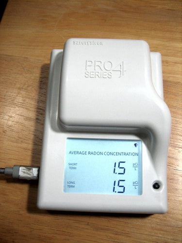 Radon Meter, No batteries required, audible alarm, displays 7 and 365 day average radon levels. An audible alarm is now required in radon mitigation system installations.